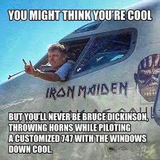 Vsquared You Might Think You Re Cool But You Ll Never Be Bruce Dickinson Throwing Horns While Piloting A Customized Iron Maiden 747 With The Windows Down Cool Vsquared V2rocks Facebook