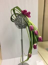 When one thinks of floral arrangements, images of perfect bouquets and conventional centerpieces are likely to spring to mind. Monthly Designs The Outdoor Gardeners Unique Flower Arrangements Creative Flower Arrangements Modern Floral Arrangements