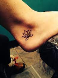 Minimalist Lotus Flower Tattoo Tattoos Foot Tattoos Neck Tattoo