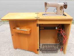 Check spelling or type a new query. Light Walnut Singer Sewing Machine Cabinet