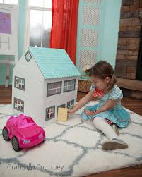 The post about the diy dollhouse siding using balsa wood is linked at the top of this post. Cardboard Box Craft Diy Dollhouse