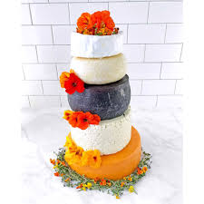 Chrissy teigen and john legendphoto: Savory Wedding Cakes You Need To See Tiered Cheese Wheels Meat Pies And More Food Wine