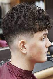 Men S Fade Haircut Keep Your Hair Short And Cool Mid Fade Haircut Fade Haircut Mens Short Curly Hairstyles