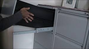 Lift the front of the drawer up, and pull it free of the cabinet. How To Remove Drawer From Bisley Filing Cabinet Fast Youtube