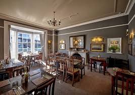 The warm light oak and white finish will create an inviting and cozy atmosphere in your home. Middle Room In The Original Building Side Picture Of The Architect Chester Tripadvisor