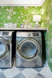 This laundry room doubles as a butler's pantry and looks gorgeous! 50 Small Laundry Room Ideas Small Laundry Room Storage Tips