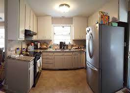 Consider frameless grey cabinets and a quartz countertop to add high gloss and shine to a modern kitchen. Agreeable Gray Kitchen 2 Cabinet Girls