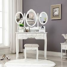 This dressing table set includes a mirrored dressing table with three drawers and a stool. Fch Wood White Vanity Makeup Dressing Table Set With Stool 7 Drawers Folding Mirror