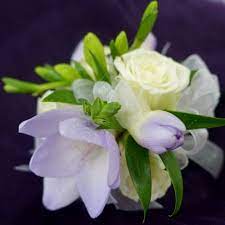 Beautiful Small Wrist Corsage With An Open Lavender Freesia And Cute White Tea Rose Lavender Rose Bouquet Wedding Flower Inspiration Flower Corsage