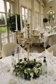 Pollen4hire Candelabra With Floral Base Decoration Candelabra Wedding Centerpieces Candelabra Wedding Candleabra Wedding Centerpieces