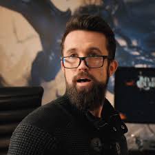 Ian Grimm wearing glasses in Non-Playable Character