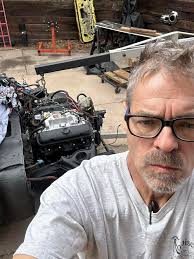 Well, after a few issues resolved, the motor is installed! I said when I  turned 40, I would never crawl under another car to work