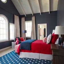 Painting ceilings a light blue started with the gullah culture once found in the carolina low country. Tall White Beamed Ceiling Over Dark Gray Walls In Patriotic Bedroom With Red Bed Cover And Armchair And Star Rug Hgtv