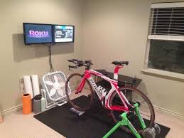 For Those Who Couldn T Afford To Stay Off Their Bike In The Winter Months The Right Indoor Cycling Trainer Can Be Gr Indoor Bike Trainer Indoor Bike Bike Room