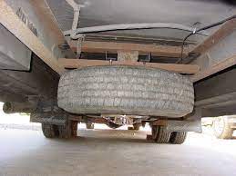 2015 xv crosstrek premium w/eyesight and premium audio kicker speakers, curt hitch, kuat sherpa bike rack just a thought, but with one of the hitch mounts for the tire, you could always simply use the hitch wiring to power an illuminated plate mount. Spare 19 5 Tire Under Chassis Irv2 Forums