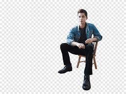 Then please go through the article below. Logan Lerman Man Sitting On Brown Chair Png Pngegg
