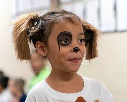 Rusk Elementary kindergarteners and first-graders parade through the  hallways this morning dressed in honor of their favorite phonic in thanks  to the Midland Education Foundation for its grant that enabled the purchase