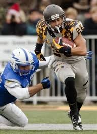 Running Angry Wyoming S Wick Uses Mentality To Fuel Success Wyoming Wyoming College Football Uniforms Ncaa College Football