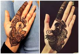 The relatively newer trend where the sides of the back hand has been beautifully styled with two distinct diagonal bheel. Try These 12 Beautiful Eid Mehendi Designs
