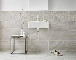 Bathroom Tile Ideas Use Large Tiles On The Floor And Walls Large Tiles That Flow From The Floor To T Bathroom Wall Tile Grey Marble Bathroom Tile Bathroom