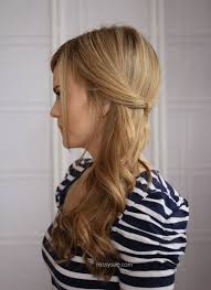 If your hair is curly, style with the tips from #8 and create two buns. Easy Side Swept Waves