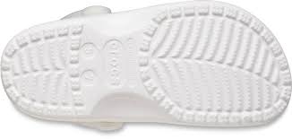 Buy crocs kids' bayaband clog and other clogs & mules at amazon.com. Bad Bunny S Glow In The Dark Crocs Collaboration Popsugar Fashion
