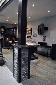 The metal poles are used to support large open areas and prevent the collapse of the first floor into the basement. Top 50 Best Basement Pole Ideas Downstairs Column Cover Designs