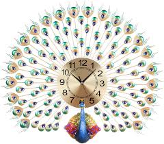 Explore mirrors, clocks, canvas wall art, framed wall art, wood wall art, metal wall art, fabric wall art, textile wall art, signs, monograms, decals, memo boards, decorative crosses, kids wall décor, wall sconces, ledges and shelves and wall hanging hardware all from at home. Langshi Home Decor Peacock Wall Clock Living Room Clock Modern Art Amazon De Kuche Haushalt