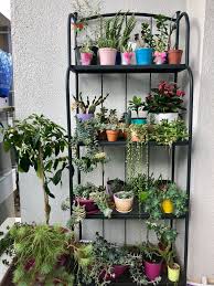 Pin By Martha Lourdes Montan Torrejon On Balkonn Plant Stand Indoor Plant Shelves Outdoor Outdoor Metal Plant Stands