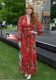 Florence Welch Teams Her Russet Locks With A Floral Orange Sun Dress Florence Welch Style Florence Welch Style