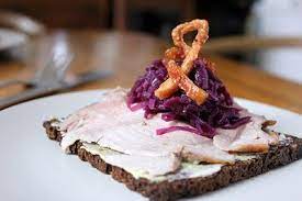 Roast Pork And Red Cabbage Flaeskesteg Med Rodkal Danish Open Sandwiches Smorrebrod Danish Food Smorrebrod Recipe Scandinavian Food
