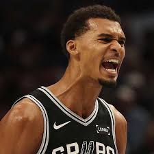 Who is the former Piston who scored 31 points in their first game?