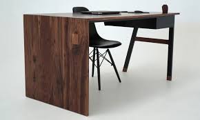 Tie two sheets of plywood together in the l of the desk using joining plates and 1 inch screws. Sean Woolsey Studio Waterfall Desk Cool Material