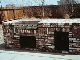 We purchased the same bricks used to build the house and cut off the outer faces using a large wet saw. Outdoor Kitchen Construction Masonry Wood Kits Prefab Landscaping Network