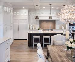 Try white countertops with your white cabinets for a fresh look. Brown Diamond Pattern Cooktop Tiles Transitional Kitchen