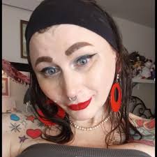 On June 24, a Portland Trantifa militant confronted federal agents outside  the ICE facility with a weapon before being tased and face-planting to the  ground. Julie Mikela Winters, real name Christopher M.