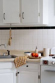 To paint kitchen cabinets without sanding or priming sugar. Apartment Progress Painted Kitchen Cabinets Reading My Tea Leaves Slow Simple Sustainable Living