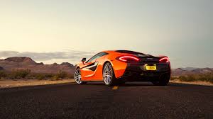 Download Wallpaper 3840x2160 Mclaren 570s Rear View Orange 4k Ultra Hd Hd Background Mclaren Sports Car Super Cars Sports Car