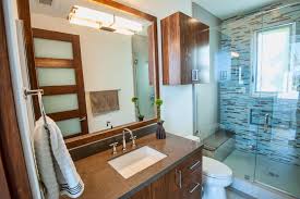 Designed with contemporary and modern accents, the shower curtain will be the perfect addition to your bathroom. Modern Neutral Bathroom With Brown Wood Cabinets Hgtv