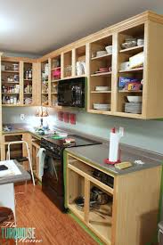 You can see thea's full kitchen makeover that we did for only $997 (including all the accessories, rug, etc.) How To Paint Kitchen Cabinets Without Fancy Equipment