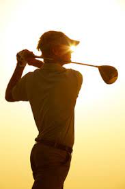 Woman dancing in a club silhouette. Silhouette Of Man Swinging Golf Club Stockphoto
