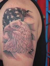 Starkly solemn, black and white patriotic tattoos are different from the usual. Black White Bald Eagle Head Us Flag Tattoo On Arm For Men