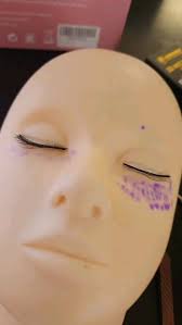 This is my new way to practice with my doll. I secure 3 practice lashes