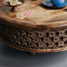 Mango wood tables work in the living room, too. Carved Wood Coffee Table