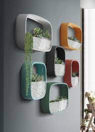It's lightweight and circular and perfect for tiny succulents, small cacti or faux plants. Alessia Modern Art Deco Planter Display Shelves In 2020 Wall Mounted Planters Modern Wall Modern Planters