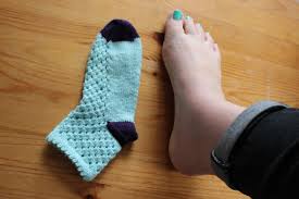 Here are two examples of knits sewn with and without a walking foot. Knit Sock On The Needles