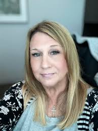 Hairstyle to hide fuller face and chin?