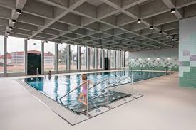 Illiz Architektur Sets Children S Swimming Pool Above Former Underground Troop Billet In Zurich Swimming Pool Architecture Dream Pool Indoor Swimming Pools