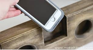 To prevent the phone's sound from escaping to the front, and to reflect it backwards, add a small panel to the front of the shelf as shown in the last photo. Diy Phone Speaker Genius Bob Vila
