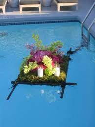 Floating flowers and candles for pool. Floating Flowers And Candles Pretty And Unique Use Different Flowers Than Shown Floating Pool Flowers Floating Pool Decorations Pool Decor